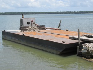 Barges will also be used to relay shells for replenishing oyster habitat.