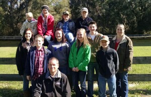 Brad and Stacey with members of their livestock judging team in 2015.