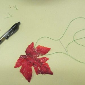 Use a gel pen to write what you are thankful for on each leaf
