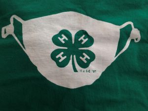 face mask with 4-H clover on it