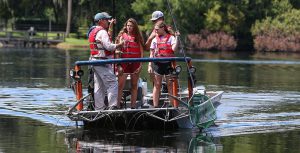 Youth and volunteer on boat