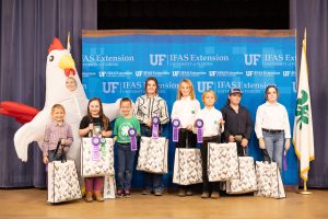 young persons with 4-H award