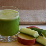 Green Juice and sliced fruit