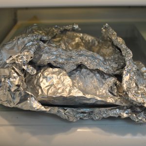 leftover food wrapped in foil