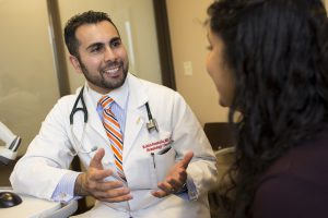 doctor speaking with a patient