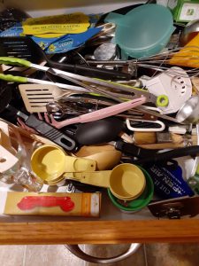 Drawer filled with kitchen utensils