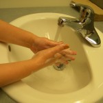 Wash your hands with soap and water for at least 20 seconds to reduce the spread of germs.